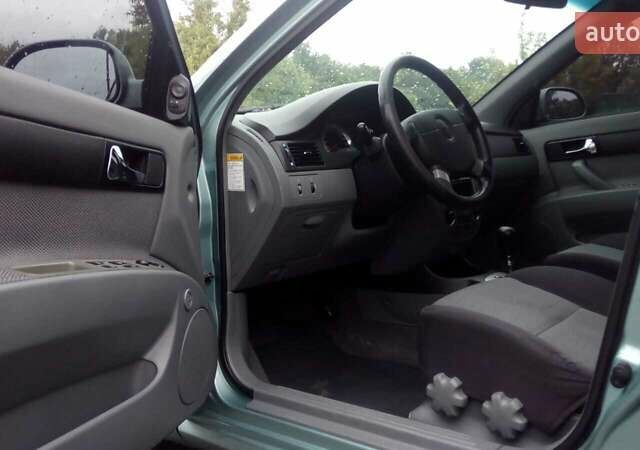 Зеленый Шевроле Лачетти, объемом двигателя 1.8 л и пробегом 120 тыс. км за 4000 $, фото 9 на Automoto.ua