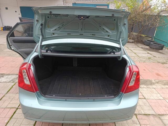 Зелений Шевроле Лачетті, об'ємом двигуна 1.6 л та пробігом 183 тис. км за 3900 $, фото 16 на Automoto.ua