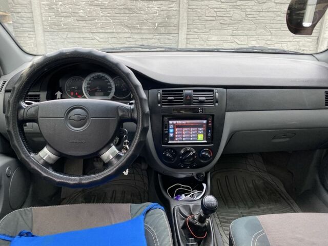 Зелений Шевроле Лачетті, об'ємом двигуна 1.8 л та пробігом 265 тис. км за 3095 $, фото 3 на Automoto.ua