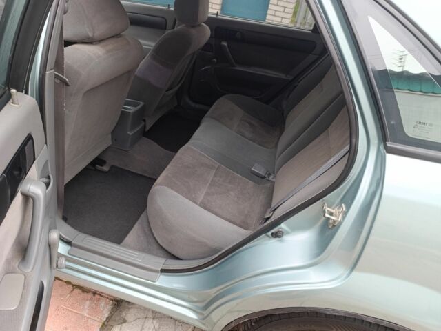 Зелений Шевроле Лачетті, об'ємом двигуна 1.6 л та пробігом 183 тис. км за 3900 $, фото 10 на Automoto.ua