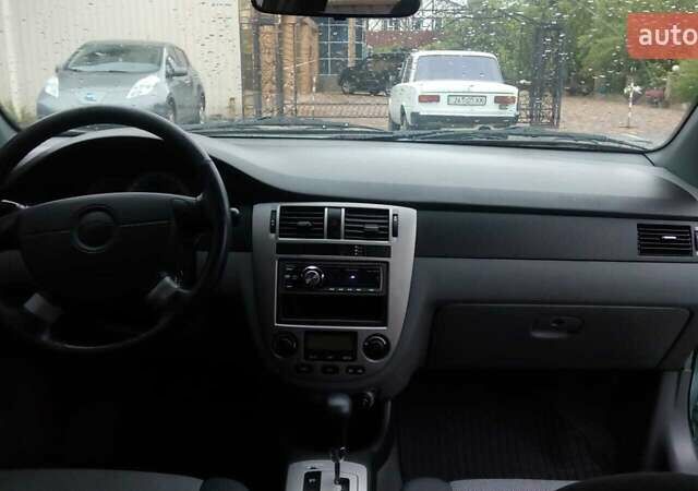 Зеленый Шевроле Лачетти, объемом двигателя 1.8 л и пробегом 120 тыс. км за 4000 $, фото 7 на Automoto.ua