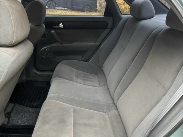 Зелений Шевроле Лачетті, об'ємом двигуна 1.8 л та пробігом 182 тис. км за 4100 $, фото 5 на Automoto.ua