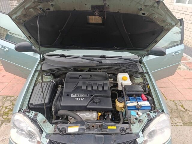 Зелений Шевроле Лачетті, об'ємом двигуна 1.6 л та пробігом 183 тис. км за 3900 $, фото 8 на Automoto.ua