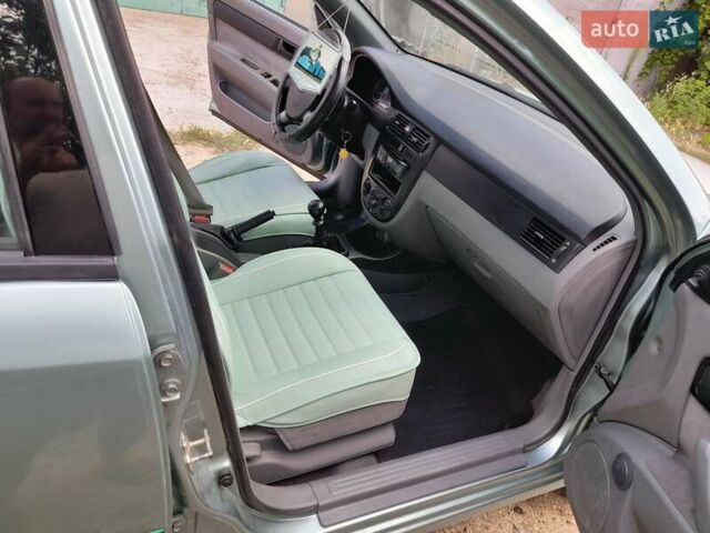 Зеленый Шевроле Лачетти, объемом двигателя 1.6 л и пробегом 197 тыс. км за 5000 $, фото 9 на Automoto.ua