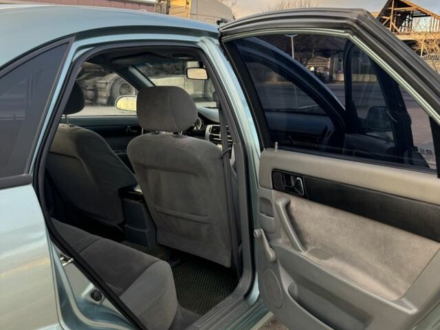 Зелений Шевроле Лачетті, об'ємом двигуна 1.8 л та пробігом 196 тис. км за 4700 $, фото 10 на Automoto.ua