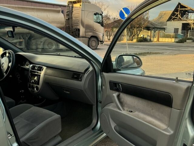 Зелений Шевроле Лачетті, об'ємом двигуна 1.8 л та пробігом 196 тис. км за 4700 $, фото 8 на Automoto.ua