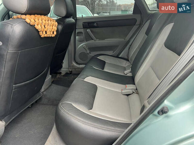 Зеленый Шевроле Лачетти, объемом двигателя 1.6 л и пробегом 237 тыс. км за 4999 $, фото 12 на Automoto.ua