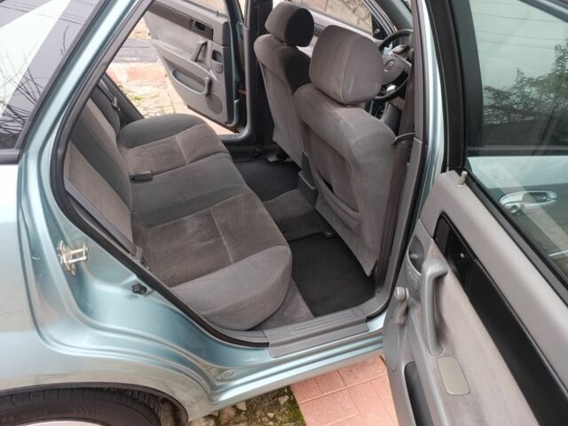 Зелений Шевроле Лачетті, об'ємом двигуна 1.6 л та пробігом 183 тис. км за 3900 $, фото 11 на Automoto.ua