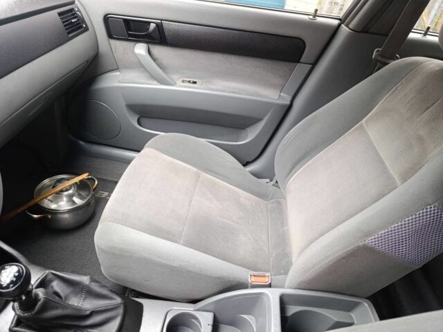 Зелений Шевроле Лачетті, об'ємом двигуна 1.6 л та пробігом 183 тис. км за 3900 $, фото 9 на Automoto.ua