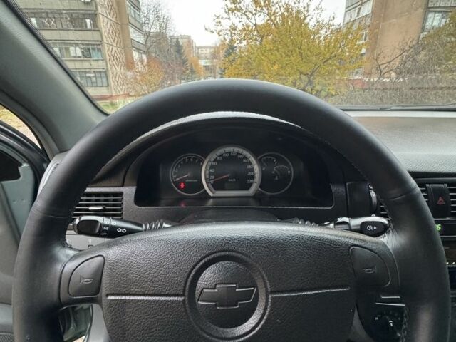 Зелений Шевроле Лачетті, об'ємом двигуна 1.8 л та пробігом 182 тис. км за 4100 $, фото 7 на Automoto.ua