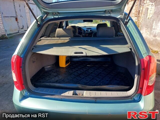 Зеленый Шевроле Лачетти, объемом двигателя 1.8 л и пробегом 213 тыс. км за 3950 $, фото 2 на Automoto.ua