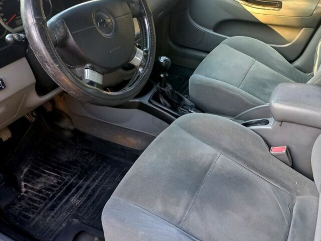 Зелений Шевроле Лачетті, об'ємом двигуна 1.8 л та пробігом 285 тис. км за 3800 $, фото 10 на Automoto.ua