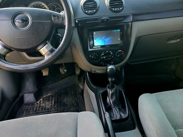 Зелений Шевроле Лачетті, об'ємом двигуна 1.8 л та пробігом 285 тис. км за 3800 $, фото 4 на Automoto.ua