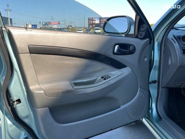 Зеленый Шевроле Лачетти, объемом двигателя 1.8 л и пробегом 238 тыс. км за 4490 $, фото 14 на Automoto.ua