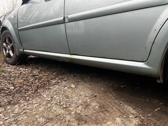 Зеленый Шевроле Лачетти, объемом двигателя 1.8 л и пробегом 350 тыс. км за 2700 $, фото 7 на Automoto.ua