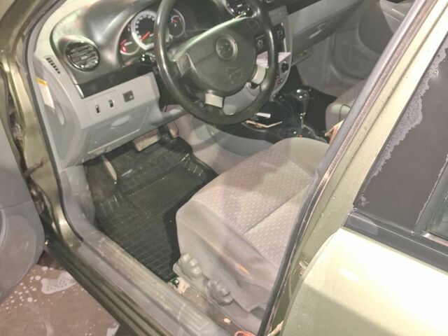 Зеленый Шевроле Лачетти, объемом двигателя 1.8 л и пробегом 340 тыс. км за 3000 $, фото 4 на Automoto.ua