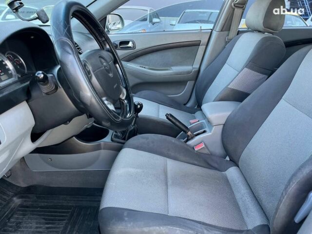 Зеленый Шевроле Лачетти, объемом двигателя 1.8 л и пробегом 238 тыс. км за 4490 $, фото 13 на Automoto.ua