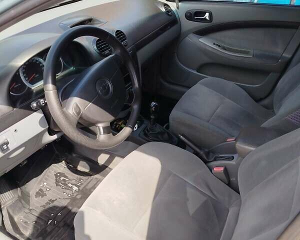 Зеленый Шевроле Лачетти, объемом двигателя 1.8 л и пробегом 426 тыс. км за 3300 $, фото 7 на Automoto.ua