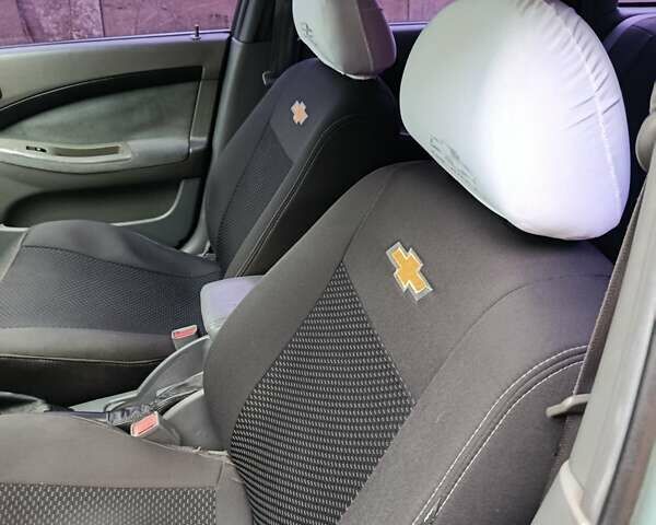 Зеленый Шевроле Лачетти, объемом двигателя 1.8 л и пробегом 207 тыс. км за 4155 $, фото 10 на Automoto.ua