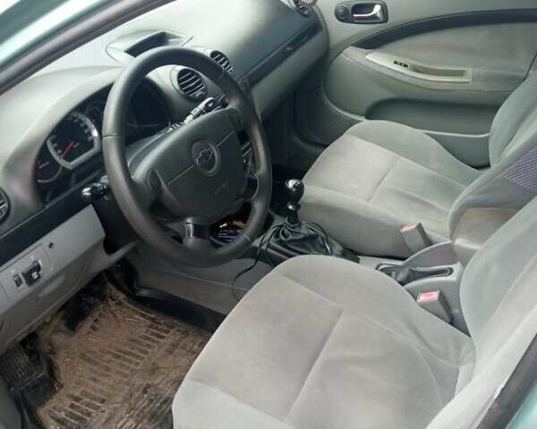 Зеленый Шевроле Лачетти, объемом двигателя 1.8 л и пробегом 426 тыс. км за 3000 $, фото 5 на Automoto.ua