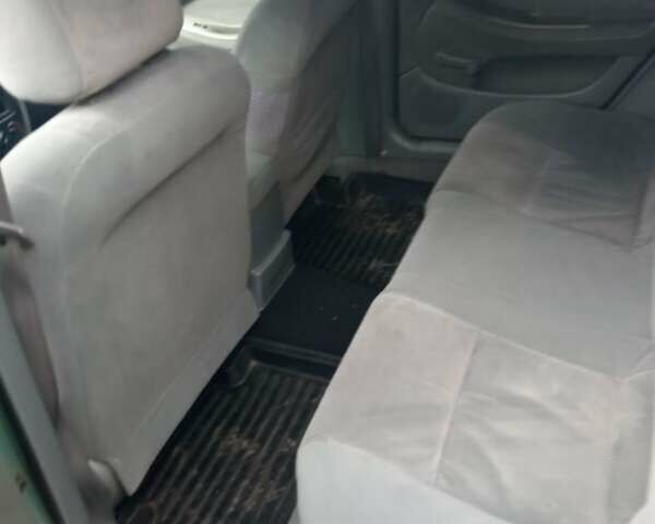 Зеленый Шевроле Лачетти, объемом двигателя 1.8 л и пробегом 426 тыс. км за 3000 $, фото 2 на Automoto.ua