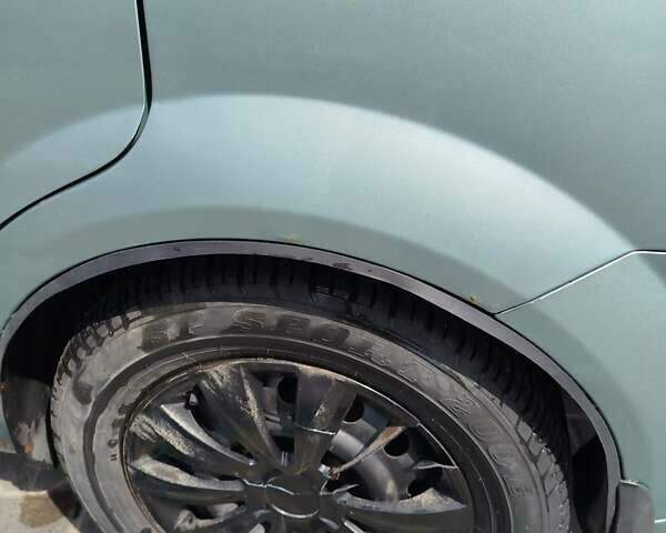 Зеленый Шевроле Лачетти, объемом двигателя 1.8 л и пробегом 426 тыс. км за 3300 $, фото 12 на Automoto.ua