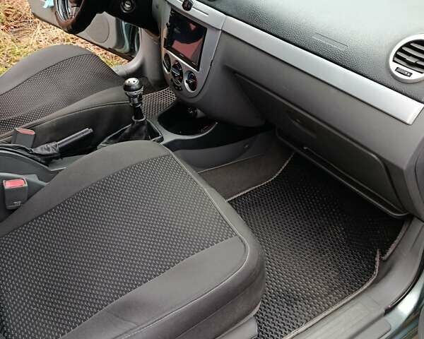 Зеленый Шевроле Лачетти, объемом двигателя 1.8 л и пробегом 207 тыс. км за 4155 $, фото 7 на Automoto.ua