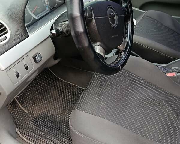 Зеленый Шевроле Лачетти, объемом двигателя 1.8 л и пробегом 207 тыс. км за 4155 $, фото 13 на Automoto.ua