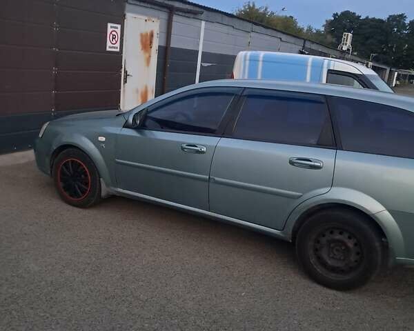 Зеленый Шевроле Лачетти, объемом двигателя 1.8 л и пробегом 300 тыс. км за 3200 $, фото 6 на Automoto.ua