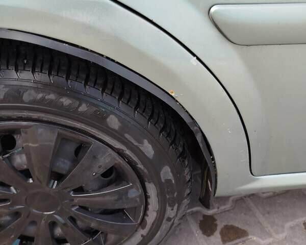 Зеленый Шевроле Лачетти, объемом двигателя 1.8 л и пробегом 426 тыс. км за 3300 $, фото 14 на Automoto.ua