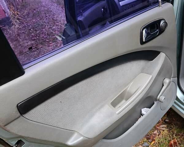 Зеленый Шевроле Лачетти, объемом двигателя 1.8 л и пробегом 207 тыс. км за 4155 $, фото 12 на Automoto.ua