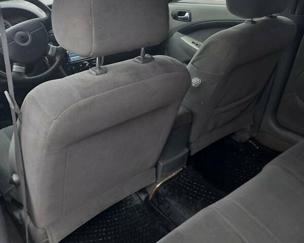 Зеленый Шевроле Лачетти, объемом двигателя 1.8 л и пробегом 205 тыс. км за 5000 $, фото 4 на Automoto.ua