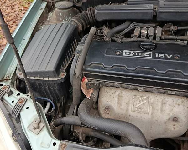 Зеленый Шевроле Лачетти, объемом двигателя 1.8 л и пробегом 207 тыс. км за 4155 $, фото 20 на Automoto.ua