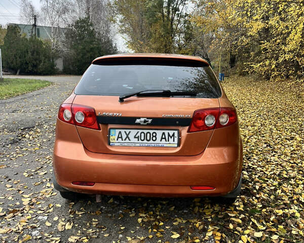 Оранжевый Шевроле Лачетти, объемом двигателя 1.6 л и пробегом 190 тыс. км за 3650 $, фото 4 на Automoto.ua