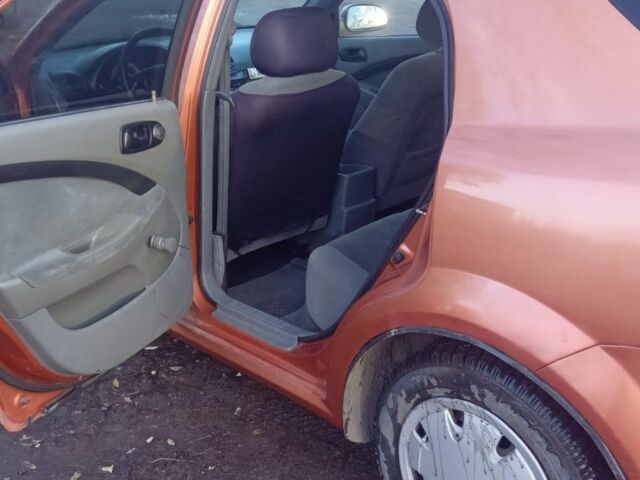 Оранжевый Шевроле Лачетти, объемом двигателя 1.6 л и пробегом 270 тыс. км за 3200 $, фото 3 на Automoto.ua