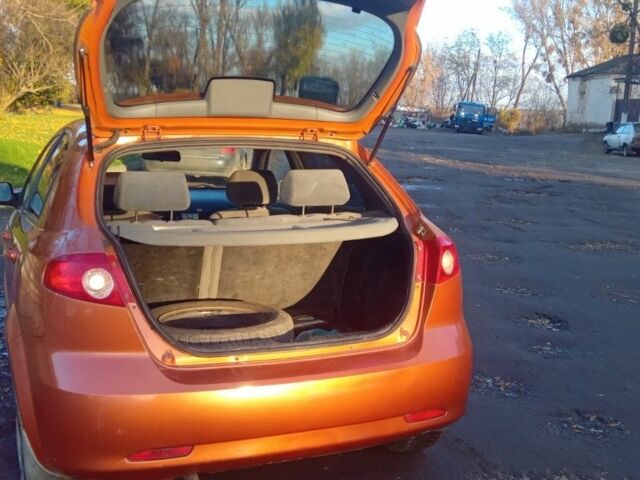 Оранжевый Шевроле Лачетти, объемом двигателя 1.6 л и пробегом 270 тыс. км за 3200 $, фото 6 на Automoto.ua