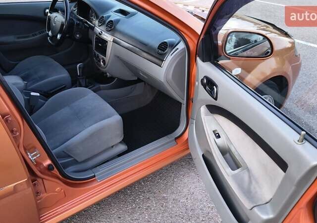 Оранжевый Шевроле Лачетти, объемом двигателя 2 л и пробегом 272 тыс. км за 3400 $, фото 7 на Automoto.ua