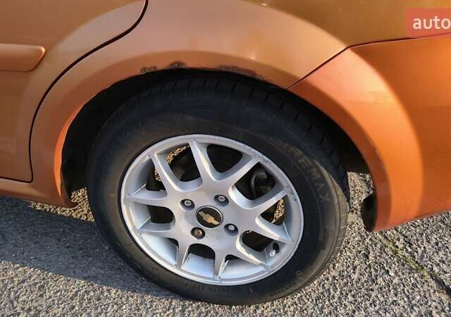 Оранжевый Шевроле Лачетти, объемом двигателя 2 л и пробегом 272 тыс. км за 3400 $, фото 8 на Automoto.ua