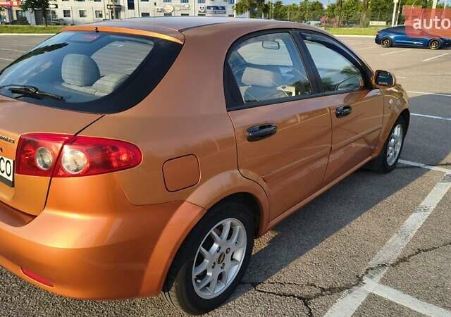 Оранжевый Шевроле Лачетти, объемом двигателя 2 л и пробегом 272 тыс. км за 3400 $, фото 11 на Automoto.ua