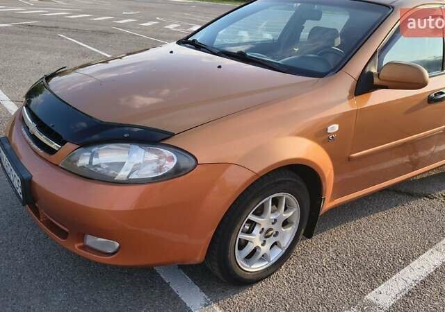 Оранжевый Шевроле Лачетти, объемом двигателя 2 л и пробегом 272 тыс. км за 3400 $, фото 12 на Automoto.ua