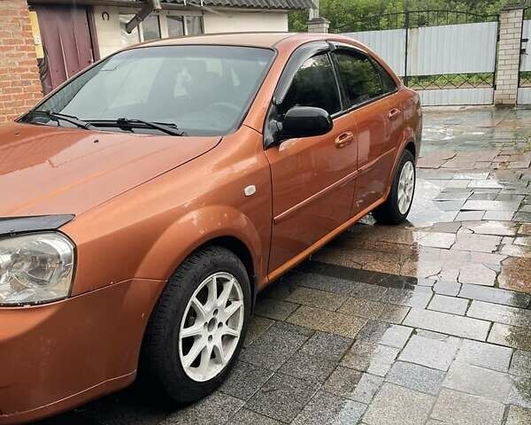 Помаранчевий Шевроле Лачетті, об'ємом двигуна 1.6 л та пробігом 300 тис. км за 2800 $, фото 1 на Automoto.ua