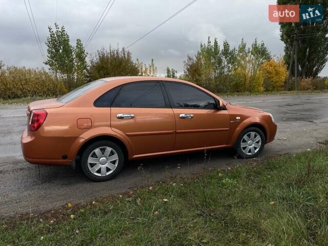 Оранжевый Шевроле Лачетти, объемом двигателя 1.8 л и пробегом 159 тыс. км за 5500 $, фото 8 на Automoto.ua