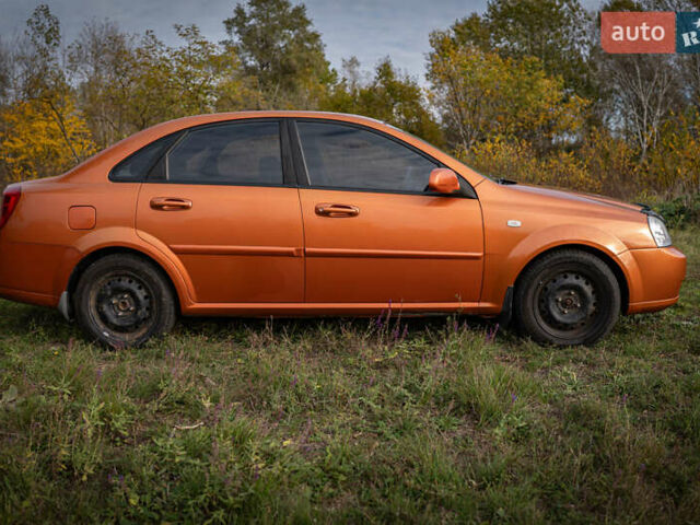 Оранжевый Шевроле Лачетти, объемом двигателя 1.8 л и пробегом 273 тыс. км за 3900 $, фото 5 на Automoto.ua