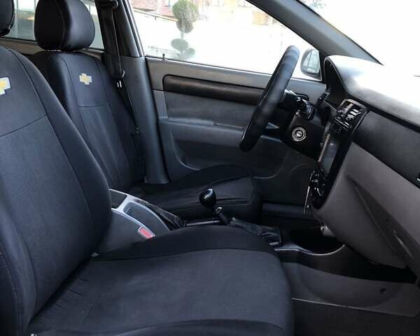 Оранжевый Шевроле Лачетти, объемом двигателя 1.6 л и пробегом 285 тыс. км за 3499 $, фото 13 на Automoto.ua