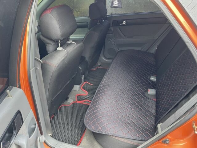 Оранжевый Шевроле Лачетти, объемом двигателя 1.8 л и пробегом 159 тыс. км за 5500 $, фото 3 на Automoto.ua