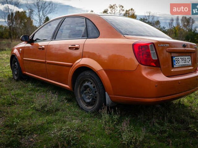 Оранжевый Шевроле Лачетти, объемом двигателя 1.8 л и пробегом 273 тыс. км за 3900 $, фото 9 на Automoto.ua