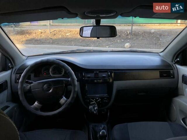 Оранжевый Шевроле Лачетти, объемом двигателя 1.6 л и пробегом 285 тыс. км за 3499 $, фото 17 на Automoto.ua