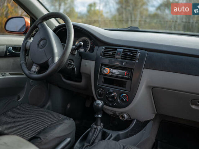 Оранжевый Шевроле Лачетти, объемом двигателя 1.8 л и пробегом 273 тыс. км за 3900 $, фото 13 на Automoto.ua