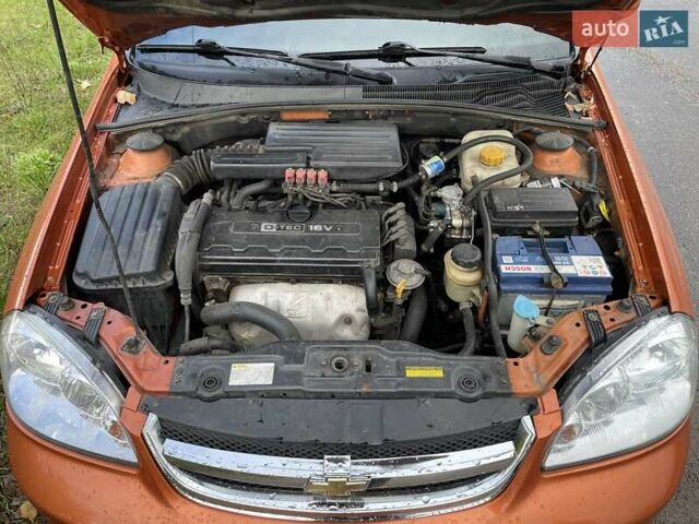 Оранжевый Шевроле Лачетти, объемом двигателя 1.8 л и пробегом 159 тыс. км за 5500 $, фото 5 на Automoto.ua
