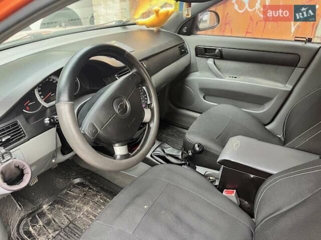 Оранжевый Шевроле Лачетти, объемом двигателя 1.6 л и пробегом 160 тыс. км за 5000 $, фото 2 на Automoto.ua